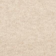 Rolli, Creme Nahaufnahme eines cremefarbenen Feinstrick-Rollkragens.