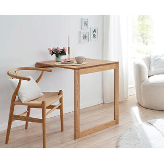 Wand-Klapptisch aus Holz mit Kaffee und Blumen auf der Oberfläche.
