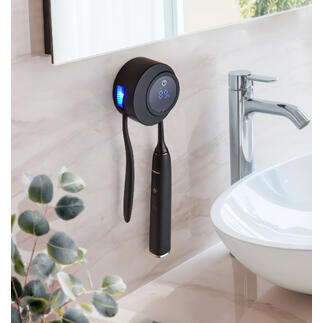 UV-Zahnbürsten Desinfektionsstation an der Wand mit schwarzem Design und LED-Anzeige.