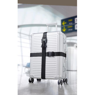 Silberner Koffer mit schwarzem Premium-Koffergurt-Set 3-in-1 auf einem Flughafen.