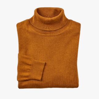 Curryfarbener Feinstrick-Rollkragenpullover, zusammengerollt.