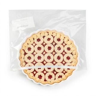 Tarte in transparenter Verpackung mit fruchtiger Füllung.