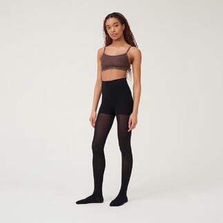 Frau trägt schwarze Beauty-Strumpfhose mit brauem Oberteil.
