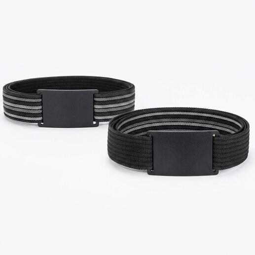 Zwei cleverbelt Vario-Wendegürtel in Schwarz und Grau auf einem Tisch.