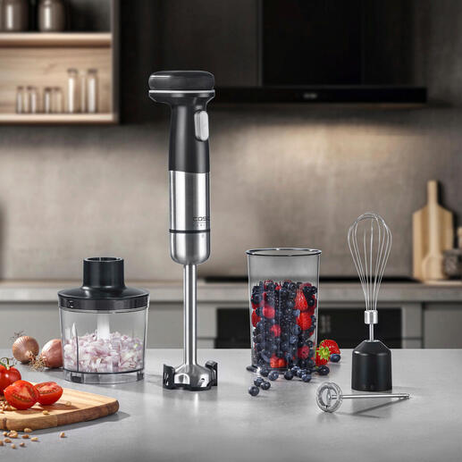 Kabelloses Stabmixer-Set mit Mixer, Rührbesen, und Behälter auf einer Küchentheke.