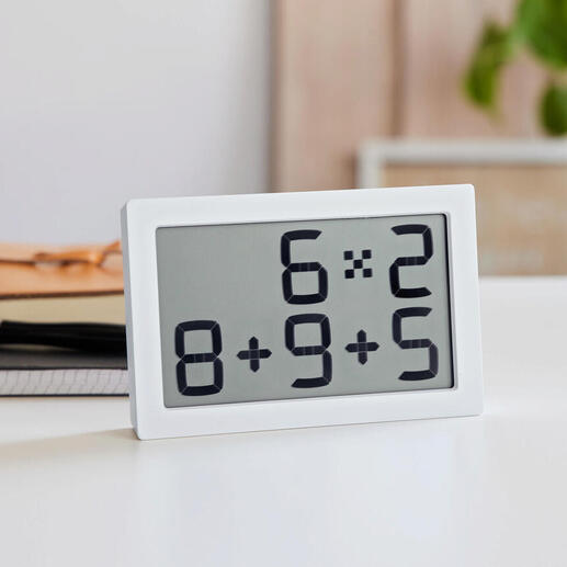 Tischuhr mit digitaler Anzeige für mathematische Aufgaben in Weiß.