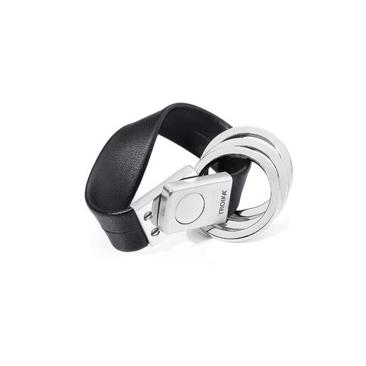 Schlüsselhalter Twister Schlüsselhalter Twister aus zwei Ringen und einem schwarzen Band.