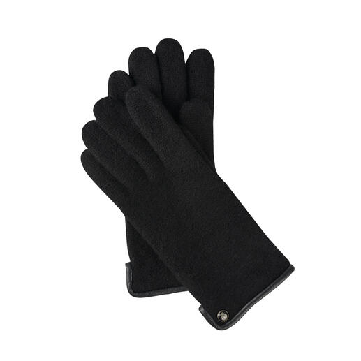 Schwarze Walkhandschuhe in angenehmer Textur, in der Hand gehalten.