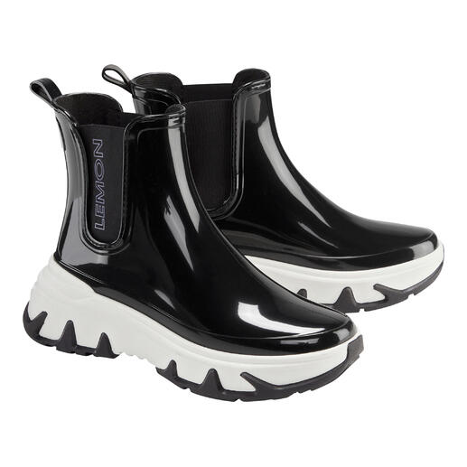 Schwarze und weiße Lemon Jelly Chelsea-Sneakerboots mit glänzender Oberfläche.