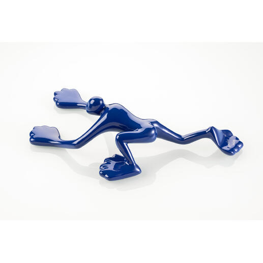 Dunkelblaue Skulptur in Form eines Frosches.