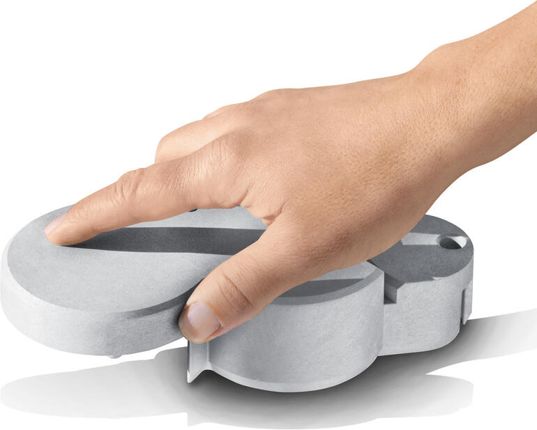 Vario-Rasenkantensteine, 12er-Set Hand, die einen Vario-Rasenkantenstein hält, auf weißem Hintergrund