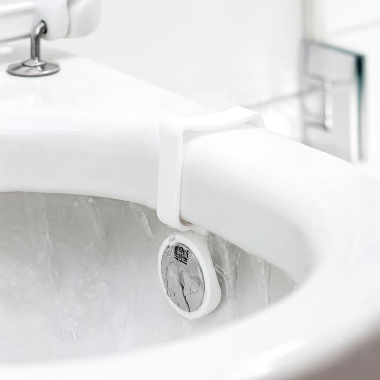 WC-Geruchskiller WC-Geruchskiller am Toilettenrand montiert