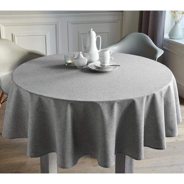 Natur/Schwarz-Melange Graues, runde Tischdecke im Leinen-Look auf einem Tisch