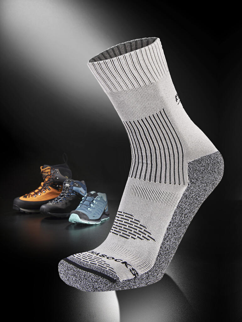 Antiblasen-Socken Antiblasen-Socke steht auf grauem Hintergrund.