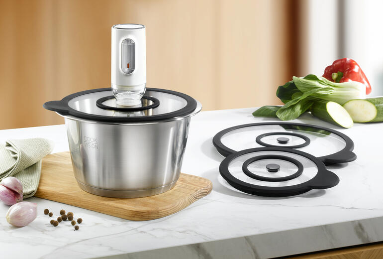 Vakuum-Deckel-Set mit Pumpe und drei verschiedenen Stöpseln.