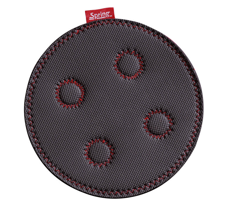 Runder magnetischer Untersetzer mit drei Vertiefungen.