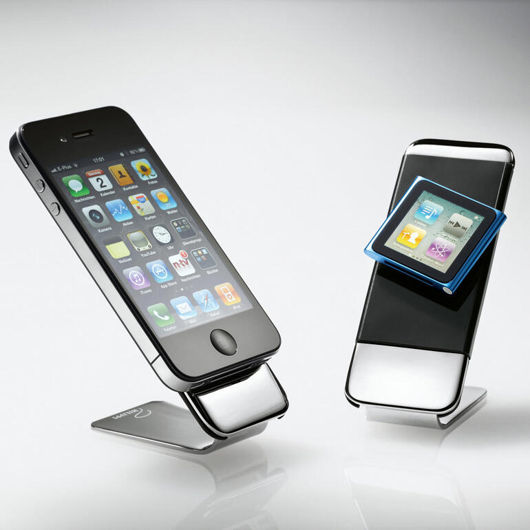 Grip Handyhalter Zwei Handyhalter mit Smartphones auf einem Tisch.