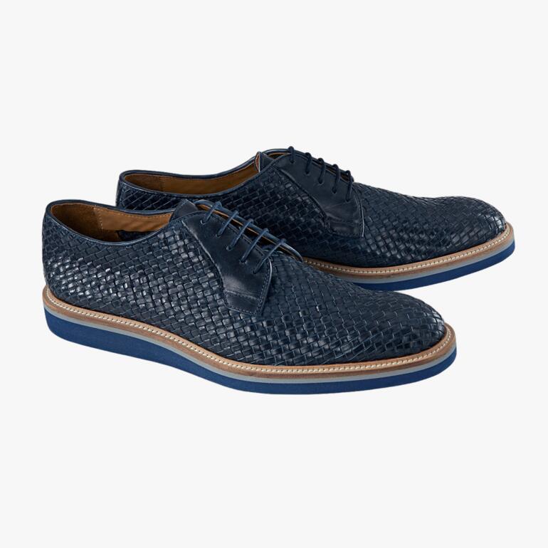 Zwei dunkelblaue Flecht-Derbys von Casanova, nebeneinander auf einem hellen Untergrund.