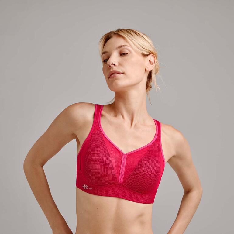 Roter Sport-BH mit Netzstoff und elastischen Trägern.