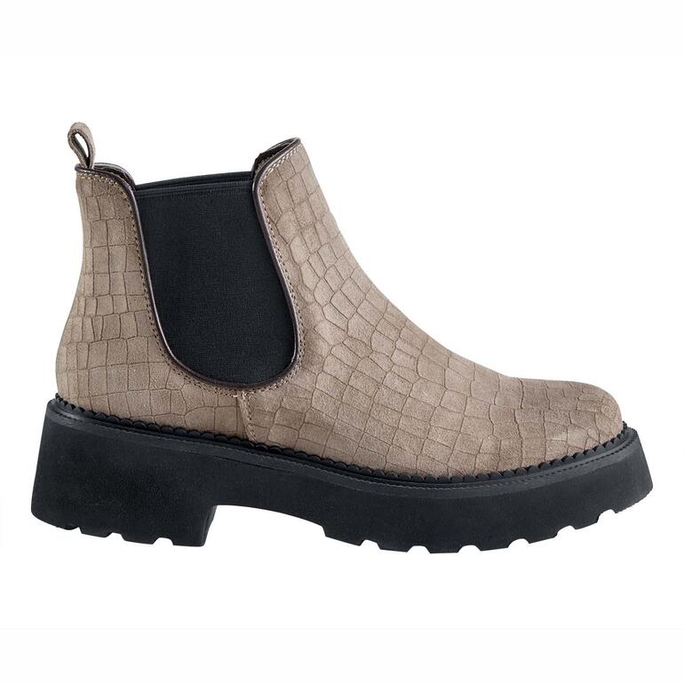 Seitenansicht beiger Chelsea-Boots mit Struktur.