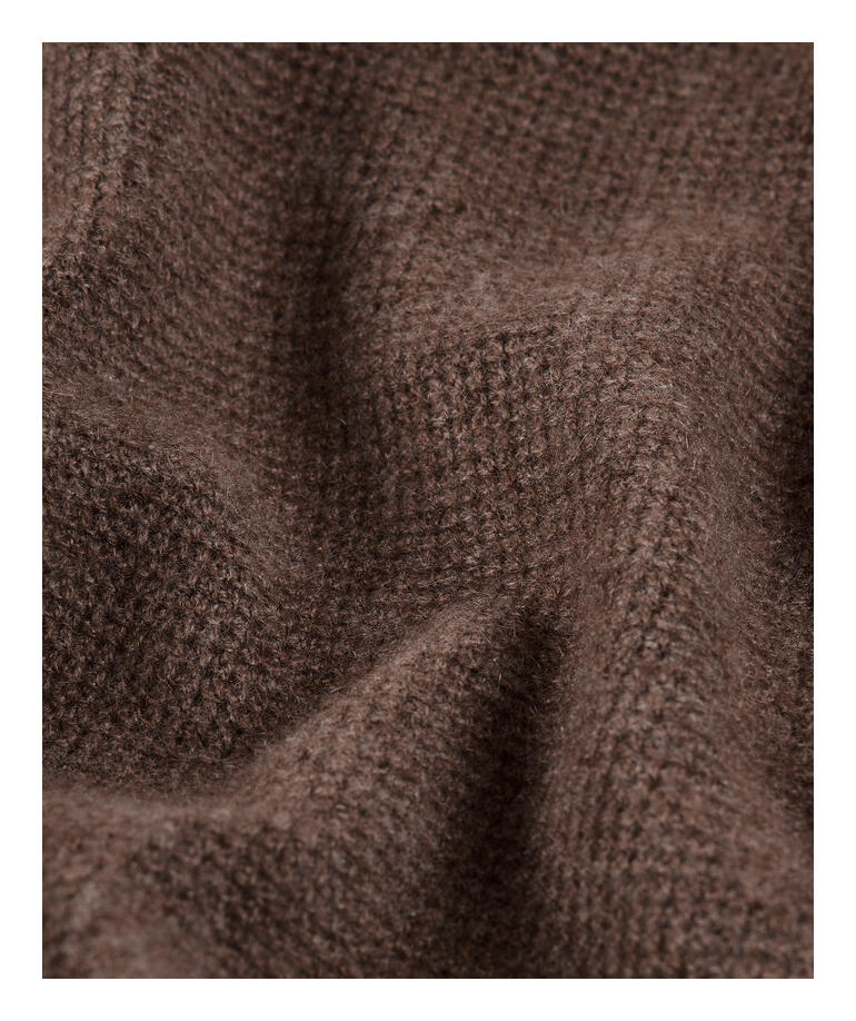 Braune Baumwollstruktur des Pique-Hoodies in Nahaufnahme